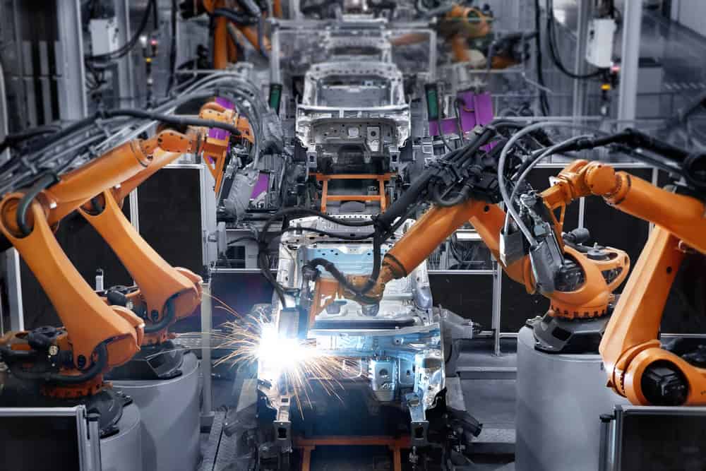 Robotic welding systems at work in factory