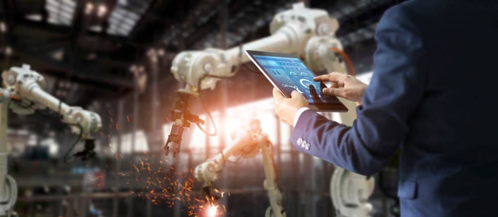 Robotic arms and operator display digital transformation in manufacturing