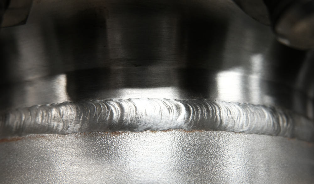 Extreme closeup of stainless steel weld