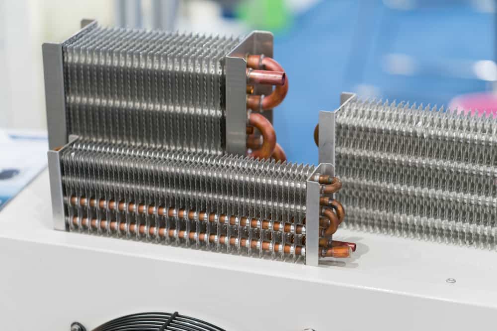 A picture of a copper piped aluminum radiator illustrating principles involved in chill blocks for welding.